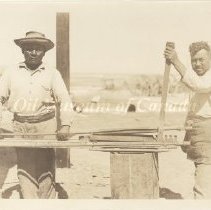 Page_14_2 Negritos, Peru. Putting guides on sucker rods